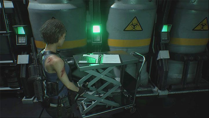 Go through the blue scanner in the Sterilization Room and enter the appropriate part of the Umbrella facility - Resident Evil 3: NEST 2 walkthrough - Story walkthrough - Resident Evil 3 Guide
