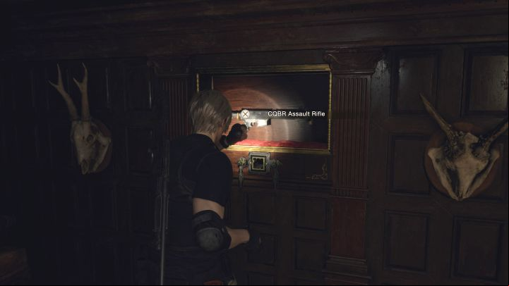 Once open, the cache with CQBR Assault Rifle will be revealed - Resident Evil 4 Remake: Secret weapon - CQBR Assault Rifle - Secrets - Resident Evil 4 Remake Guide