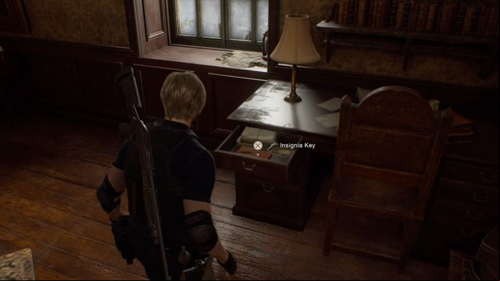 You have to get the Insignia Key at the very end of Chapter 2 - after picking it up, a cutscene will start and then you will be presented the summary screen - Resident Evil 4 Remake: How to open Doors with Insignia? - Campaign - Resident Evil 4 Remake Guide