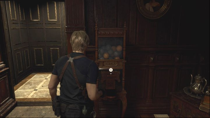 There is a machine next to the elevator - Resident Evil 4 Remake: All Shooting Range - Secrets - Resident Evil 4 Remake Guide
