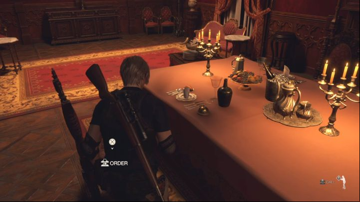 We've pictured Leon's chair above - this seat is a bit closer to the paintings - Resident Evil 4 Remake: Dining Hall chairs puzzle (Chapter 9) - Puzzle solutions - Resident Evil 4 Remake Guide