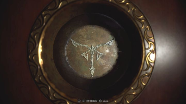 Now start turning the balls sideways to match the pattern - we've pictured the solution to the puzzle as well - Resident Evil 4 Remake: Puzzles in the Village Chiefs Manor (Chapter 2) - Puzzle solutions - Resident Evil 4 Remake Guide