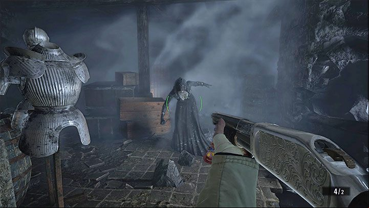 From this point on, the course of the fight will become very familiar - wait for the vampire to appear next to the demolished wall where the cold air is - Resident Evil Village: Castles Courtyard - walkthrough - Dimitrescu Castle - Resident Evil Village Guide