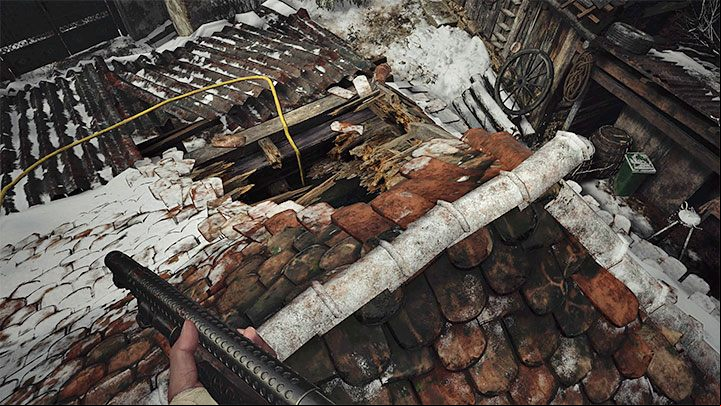 You need to locate the ladder again, this time to get to the roof of the building you are looking for and to get inside by jumping through the large hole in the roof - Resident Evil Village: Finding the house with the red chimney - walkthrough - Village - 2nd visit - Resident Evil Village Guide