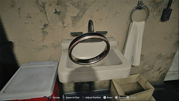 Select the ring from the inventory to Examine it - Resident Evil Village: Getting out of the basement - walkthrough - Beneviento House - Resident Evil Village Guide