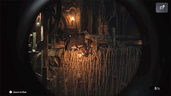 As you make your way through the stronghold, you can use the option to slide down the rope to quickly escape to the ledge at the opposite end of the room - Resident Evil Village: Going through the stronghold - walkthrough - Fortress - Resident Evil Village Guide