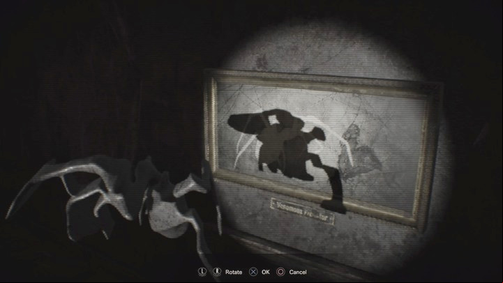 Rotate the object until it fits the empty area on the picture, and then press the interaction button - Resident Evil 7: Main House: Main Hall walktrough - Resident Evil VII Walkthrough - Resident Evil 7 Guide, Walkthrough