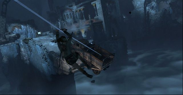 At the gate, use the rope tied to the truck - Rise of the Tomb Raider: Break through the door, walkthrough - Shortcut - Rise of the Tomb Raider Guide