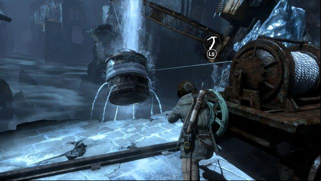 Move the cart with the hoist, more or less, halfway along the track - Rise of the Tomb Raider: Break through the door, walkthrough - Shortcut - Rise of the Tomb Raider Guide