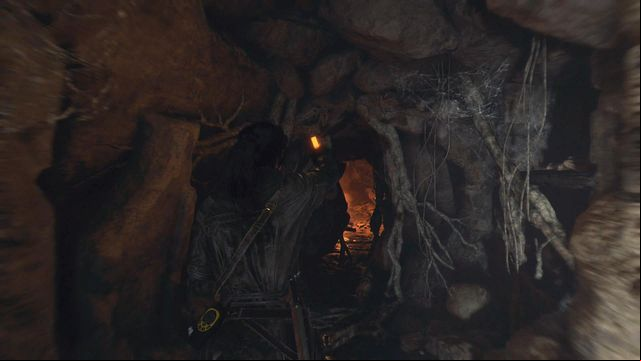Cross the narrow age in the wall of the cave - Rise of the Tomb Raider: Find an entrance into the archives, walkthrough - The Cathedral - Rise of the Tomb Raider Guide