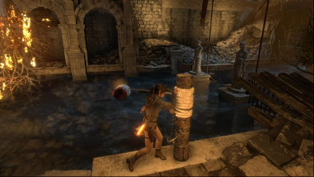 Quickly, follow the water current for several steps and stand next to the pole wound in rope - Rise of the Tomb Raider: Find a way to escape with the Atlas, walkthrough - Rising Tide - Rise of the Tomb Raider Guide