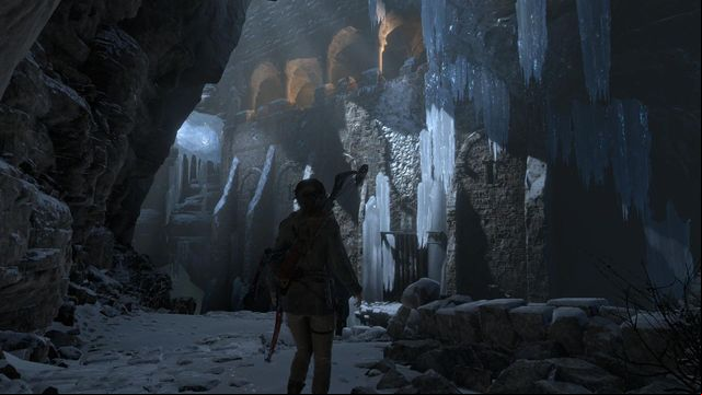 Jump over onto the walls, and use the hatchet to climb towards the edge - Rise of the Tomb Raider: Find a way into the heart of Kitezh, walkthrough - Through the Glacier - Rise of the Tomb Raider Guide