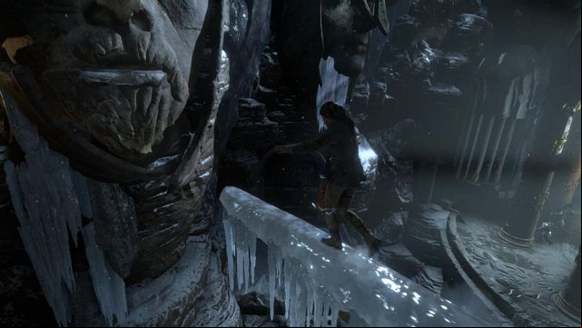 Jump over onto the lips of the huge head, from the beam covered with ice - Rise of the Tomb Raider: Find a way into the heart of Kitezh, walkthrough - Through the Glacier - Rise of the Tomb Raider Guide