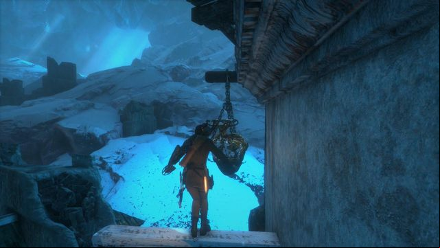 Climb up the tower and jump towards the object hanging on chains which, after it turns allows you to go higher - Rise of the Tomb Raider: Go to the other trebuchet, walkthrough - Gate Crasher - Rise of the Tomb Raider Guide