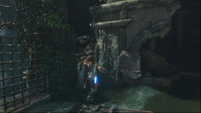 Jump again on the wooden platform and this time let the water wash you off - Rise of the Tomb Raider: Climb to the top of main chamber of tomb walkthrough - Syria - Lost tomb - Rise of the Tomb Raider Guide