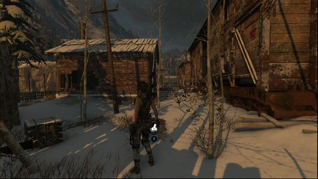 A bit behind the building, at the car - Rise of the Tomb Raider: Survival Caches, Soviet Installation secrets, map, tips - Soviet Installation - Rise of the Tomb Raider Guide