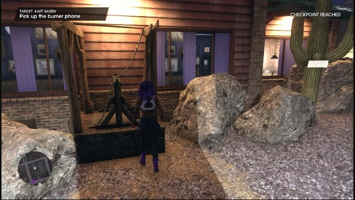 When you get to the place marked on the map, you will see a stationary phone attached to an old well, right next to the bar - Saints Row 2022: Kart Queen - how to complete contract? - Wanted - Saints Row Guide, Walkthrough