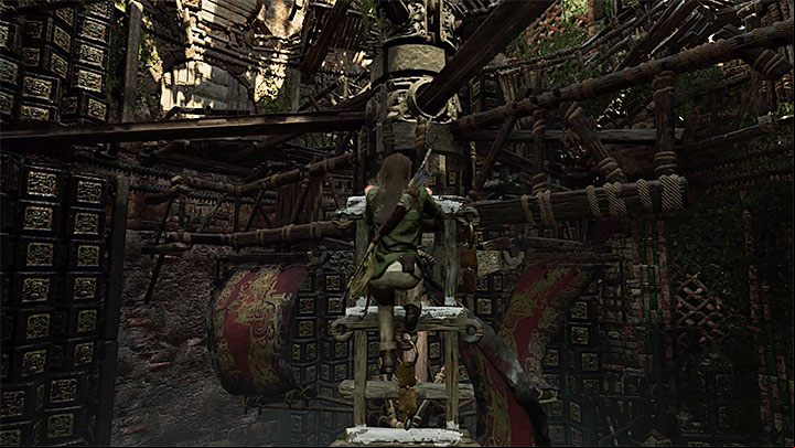 Get near the central, rotating construction - How to complete the Trial of the Eagle in Shadow of the Tomb Raider Game? - Solving Riddles - Shadow of the Tomb Raider Game Guide