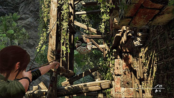 Examine the damaged, outer part of the tower and you will find the round lever shown on the picture - How to complete the Trial of the Eagle in Shadow of the Tomb Raider Game? - Solving Riddles - Shadow of the Tomb Raider Game Guide