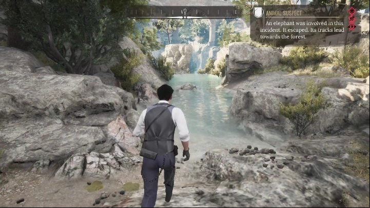 Eventually you will reach the narrow river, surrounded by rocks - Sherlock Holmes Chapter One: Gilded Cage, elephant escape - walkthrough - A gold-plated cage - Sherlock Holmes Chapter One Guide
