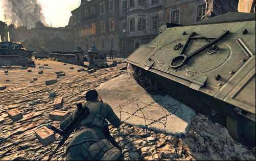 Crawl further to the right - try not to get too far onto the small debris pile by the tank, as you will get noticed - Mission 10 - Brandenburg Gate - p. 2 - Walkthrough - Sniper Elite V2 Game Guide & Walkthrough