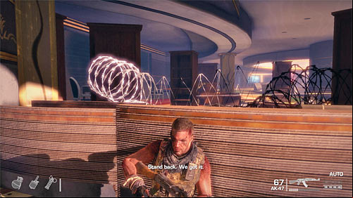 After the fight, pick up Kalashnikov and place yourself at the left wall shown on the above screen - Chapter XI - Alone - Game Walkthrough - Spec Ops: The Line - Game Guide and Walkthrough