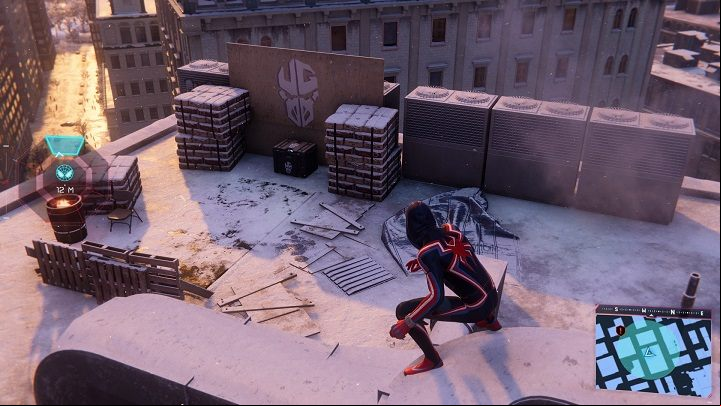 2) The next one is also placed on the rooftop, between some packages - Spider-Man Miles Morales: All Underground Caches - list - Collectibles - Spider-Man Miles Morales Guide