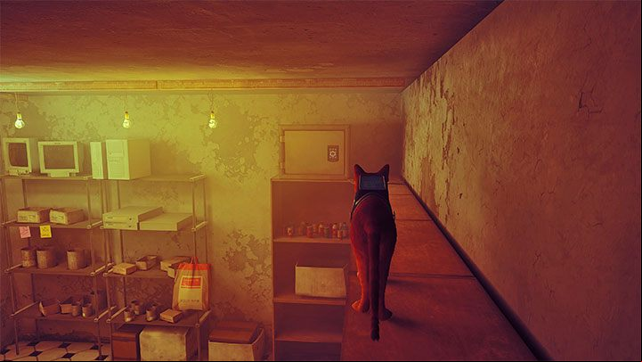Jump to the counter and then jump inside the store to start exploring it - Stray: The safe puzzle in the store - Midtown - Puzzles - Stray Guide, Walkthrough