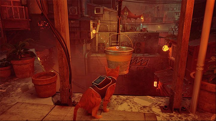 After watching the cutscene, approach the shutter with Momo standing next to it - Stray: The Slums, Chapter 4 - walkthrough - Walkthrough - Stray Guide, Walkthrough