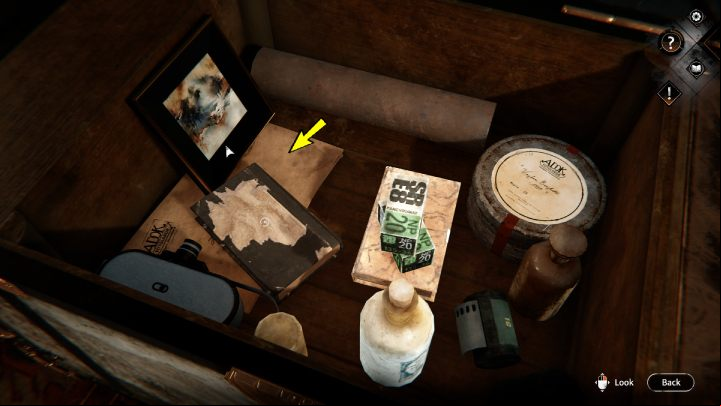 Move the book with the tattered cover and pick up the letter underneath - Syberia The World Before: Vaghen - Silberspiegel refuge, autumn 2005 part 1 - walkthrough - Walkthrough - Syberia The World Before Guide