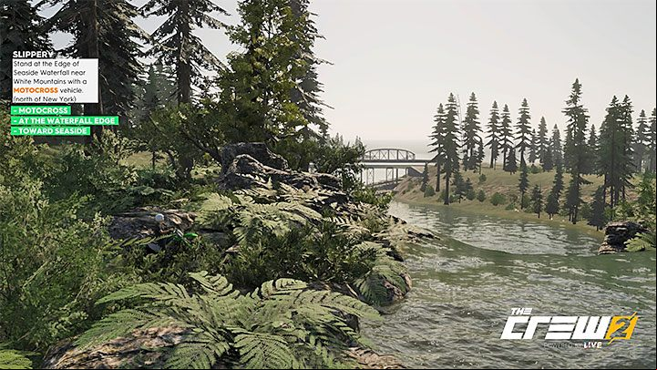 Description: Stand at the Edge of Seaside Waterfall near White Mountains with a Motocross vehicle (north of New York) - Album - Off-Roadin in The Crew 2 - Photo Ops - The Crew 2 Game Guide