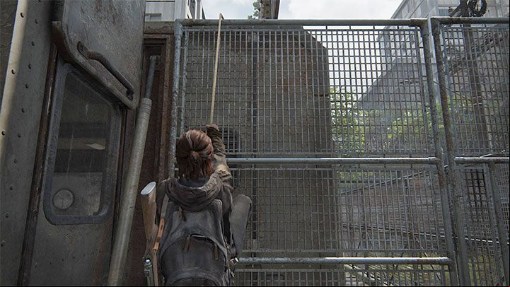 You must use the hanging cable to climb up to the roof of the Mobile Command Centre - The Last of Us 2: The Gate - collectibles, artefacts, coins - Seattle Day 1 - Ellie - The Last of Us 2 Guide
