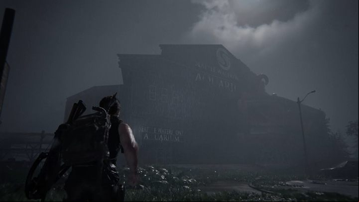 Walk towards the aquarium, climbing on vehicles and walking along a bridge - The Last of Us 2: The Coast, Seattle Day 1 Abby walkthrough - Seattle Day 1 - Abby - The Last of Us 2 Guide