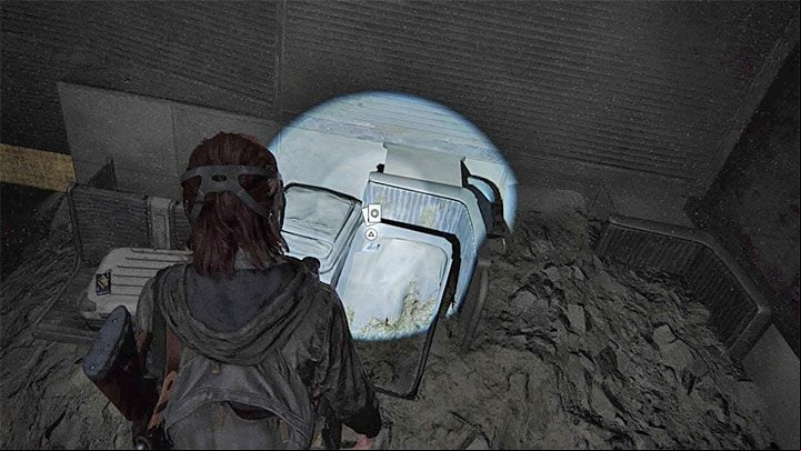 On the other side you will find a trading card lying on some bags - The Last of Us 2: The Tunnels - collectibles, artefacts, coins - Seattle Day 1 - Ellie - The Last of Us 2 Guide