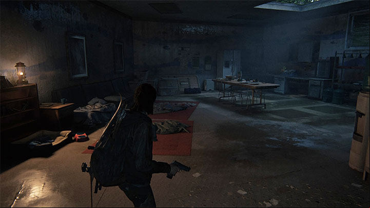 After dealing with the animal, reach a room with sleeping bags and a table for communal meals - The Last of Us 2: Infiltration - collectibles, artefacts, coins - Seattle, Day 3 - Ellie - The Last of Us 2 Guide
