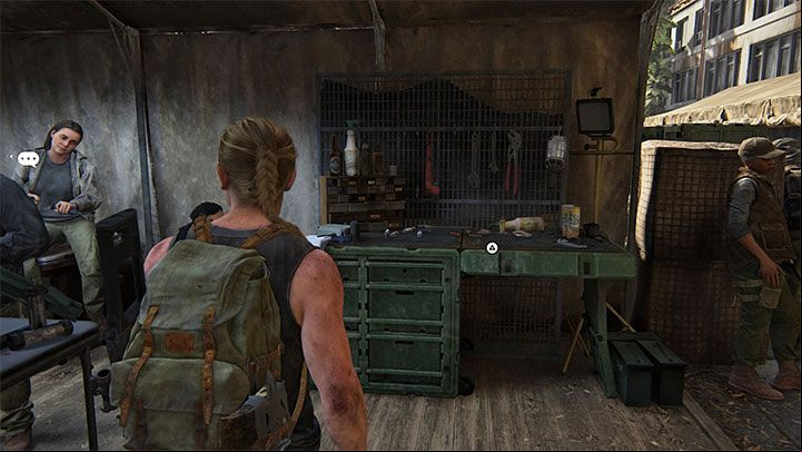 A workbench is inside one of the tents - The Last of Us 2: The Forward Base - collectibles, artefacts, coins - Seattle Day 1 - Abby - The Last of Us 2 Guide