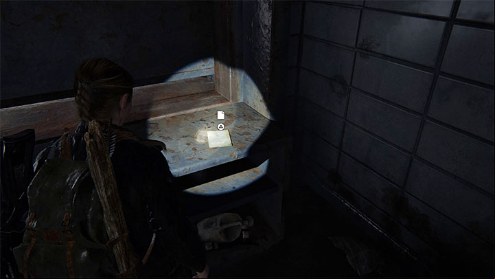 The document is lying on the counter - The Last of Us 2: The Marina - collectibles, artefacts, coins - Seattle Day 3 - Abby - The Last of Us 2 Guide