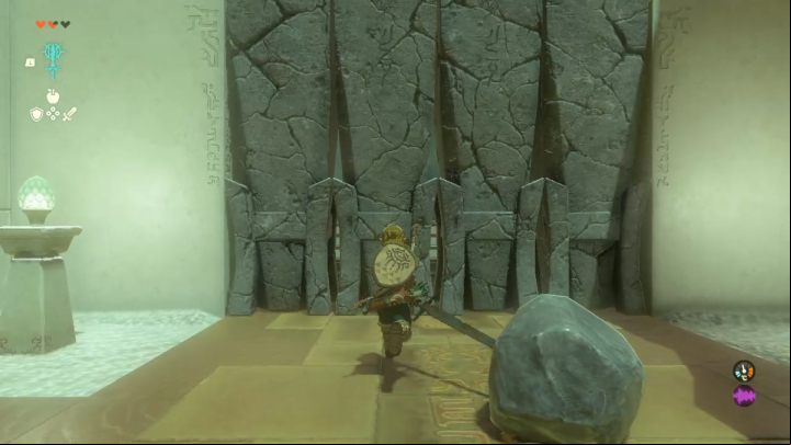 Attach the boulder to the sword with Fuse and destroy the stone door - Zelda TotK: In isa Shrine - Sky - Zelda Tears of the Kingdom Guide