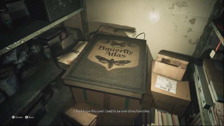 A butterfly atlas is on one of the shelves with miscellaneous items - The Medium: Thomas apartment - walkthrough - Walkthrough - The Medium Guide