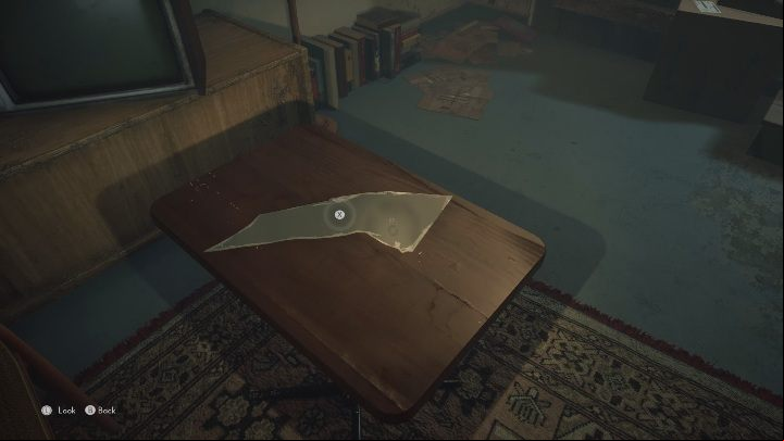 The last piece of the mirror is on the table, right next to the TV - The Medium: Thomas apartment - walkthrough - Walkthrough - The Medium Guide