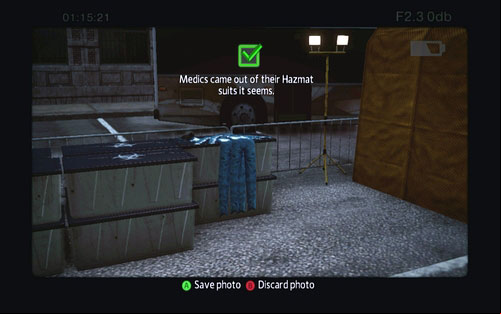 Blue suits handing on the fence behind the big bus - Photo articles - Challenges - The Amazing Spider-Man - Game Guide and Walkthrough