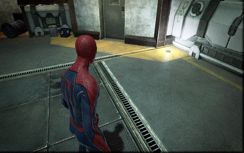Approach the barrier on the right and look down - Chapter 03 - In the Shadow of Evils Past - p. 1 - Collectibles inside buildings - The Amazing Spider-Man - Game Guide and Walkthrough