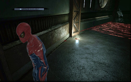 Can be found nearby the red lasers - Chapter 07 - Spidey to the Rescue - p. 1 - Collectibles inside buildings - The Amazing Spider-Man - Game Guide and Walkthrough