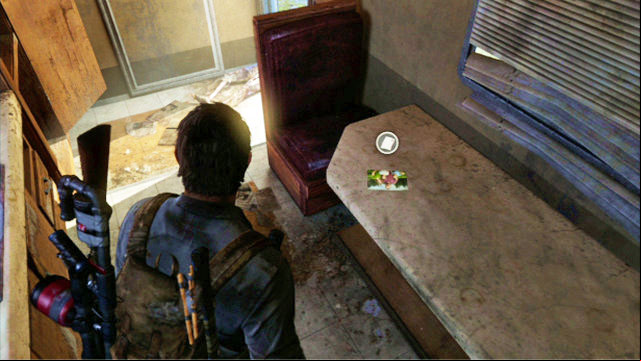 The photo is inside, on the table - The Last of Us: Bus Depot, Artifacts and pendants - Artifacts and pendants - The Last of Us Guide