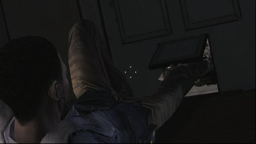 Lee also starts running towards him but he gets caught by a zombie - Chapter 2: Siege | Episode V: No Time Left - Episode V: No Time Left - The Walking Dead Game Guide
