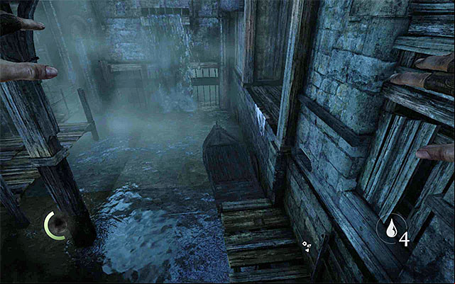 Take a turn to the right, immediately, and approach the crates suspended down from the crane - Reach Erins hideout - description - The City - Thief - Game Guide and Walkthrough