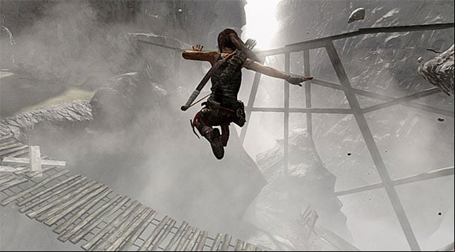 When you reach the end of the tunnel, leap across towards the drawbridge - Find a Way Out | 11: Another Fine Mess Walkthrough - 11: Another Fine Mess | Walkthrough - Tomb Raider Game Guide
