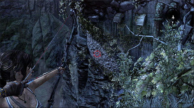 Position yourself at the edge and using the bow aim at another interactive wall shown on the screen, in order to make a rope bridge - Enter the Research Base | 23: Storm Chaser Walkthrough - 23: Storm Chaser | Walkthrough - Tomb Raider Game Guide