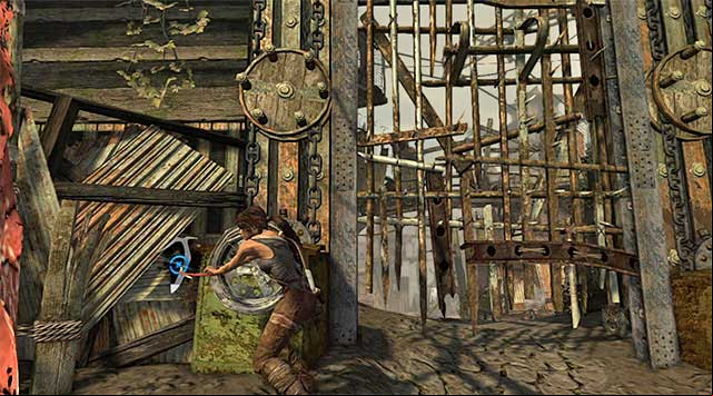 Approach the left gate mechanism and use the climbing axe (tap the action button) to unlock access to the southern area of the town, and a new base camp (Ancient Gate) (reward: 100 XP) - Reach the Gate Under the Bridge | 14: Highway to Hell Walkthrough - 14: Highway to Hell | Walkthrough - Tomb Raider Game Guide