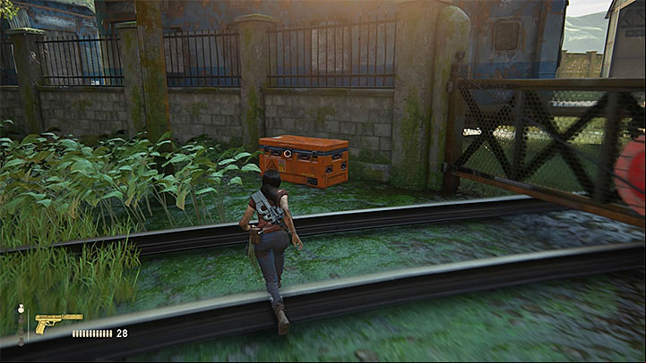 The second accessible chest is located at the other end of the trainyard, next to a large wall and a locked gate (screenshot above) - Right Under Your Nose | Trophy Guide - Trophy Guide - Uncharted: The Lost Legacy Game Guide